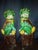 Add protection, charm, and vibrant traditional elegance to your space with this striking pair of vintage ceramic Foo Dogs...