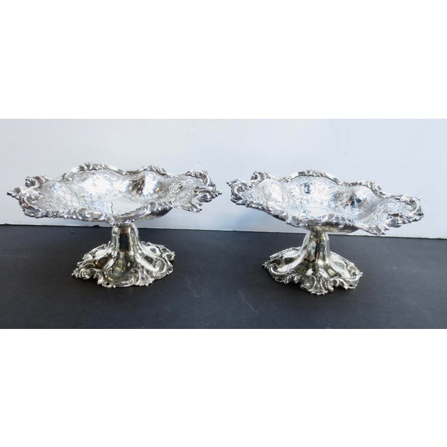 Galt & Bros., sterling silver compotes with a heavy Belle Époque design. Pierced and engraved pattern in matching stands....