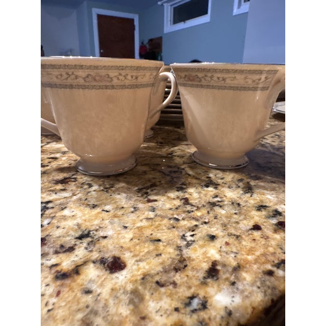 This is a 52-piece estate collection of vintage, discontinued Lenox fine bone china in the "Charleston" pattern. The...