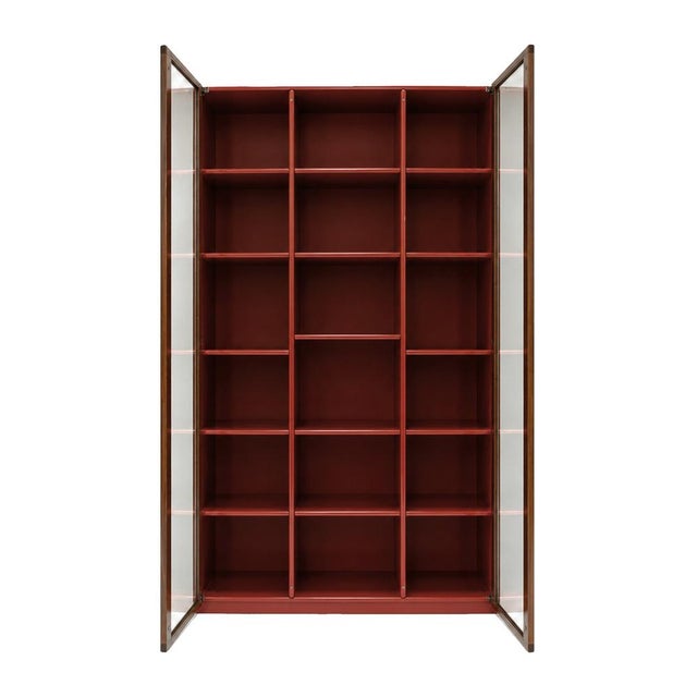 The vitrine, designed by afra and tobia scarpa in the 1960s, is a refined and highly architectural example of italian...