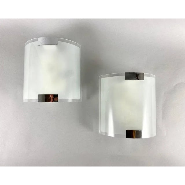 Paired wall lamps from trio lighting, germany, 2009. pair of sconces are made of high quality glass with metal elements....