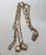 Vintage 1949 Signed Monet Goldtone Perfume Charms Sautoir Necklace For Sale - Image 12 of 14