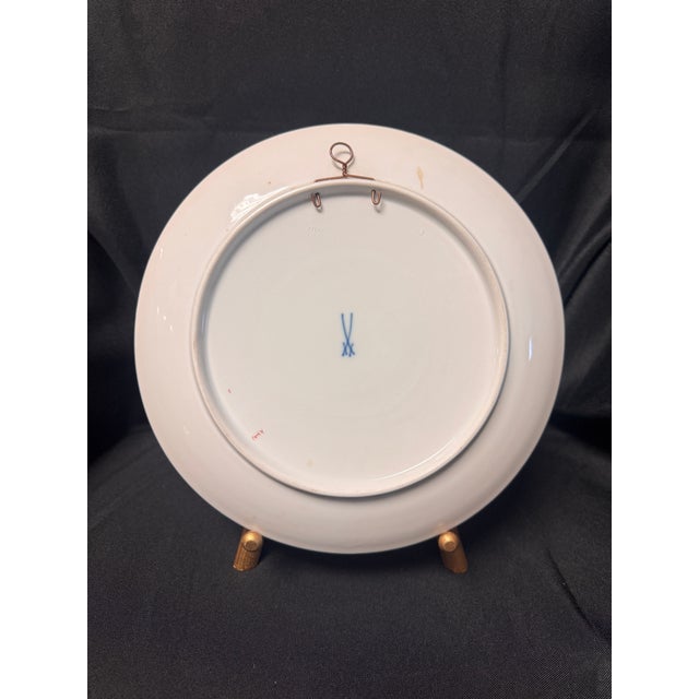 A striking vintage Meissen porcelain wall plate featuring the iconic Green Ming Dragon motif, dating to the 1970s....