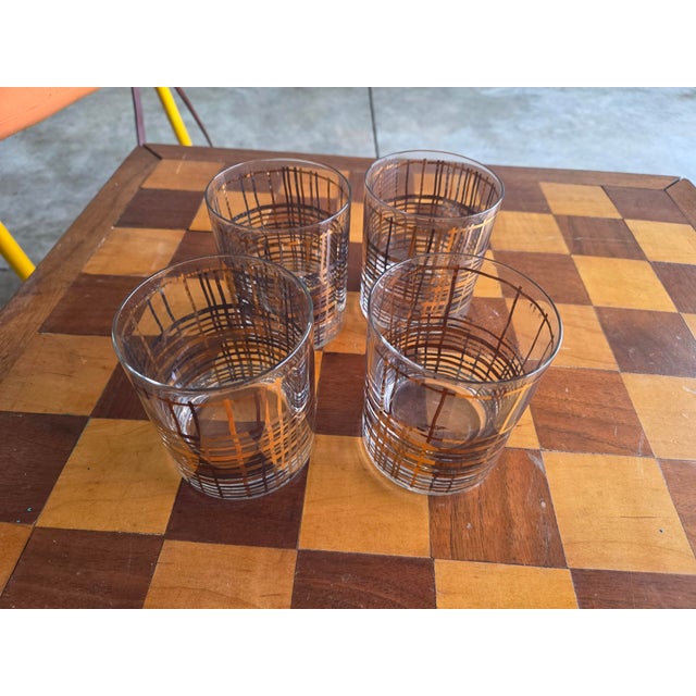 set of 4 vintage krosno Poland bar glasses. The pattern is a plaid design.