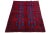 Red and blue handmade Persian Shiraz wool rug with the allover tribal motif. This rug measures 6'8" x 9'6".