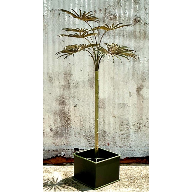 Bring a touch of coastal glamour to your space with this stunning Vintage Italian Tole Metal Palm Tree. Handcrafted with...