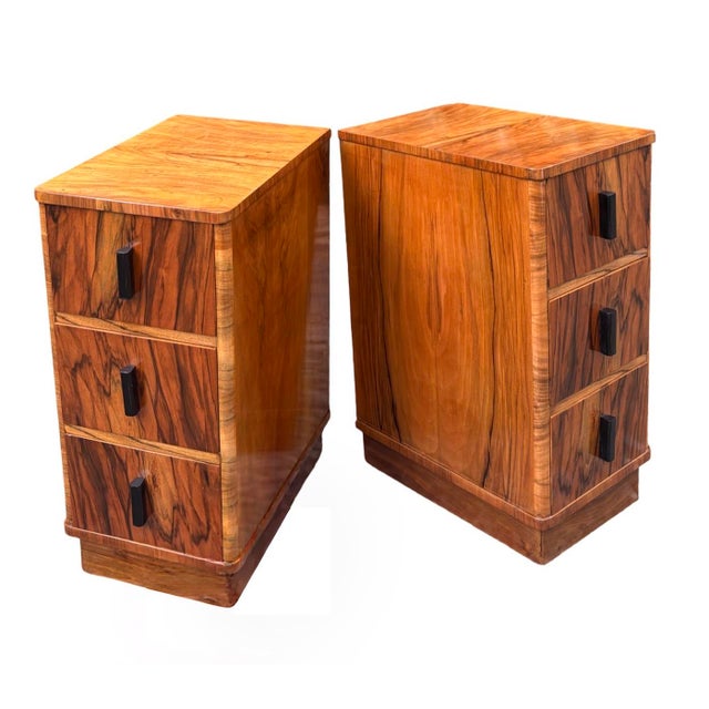 A matching pair of Art Deco bedside cabinets dating to 1930. The dovetailed drawers all run smoothly and are nice and deep...