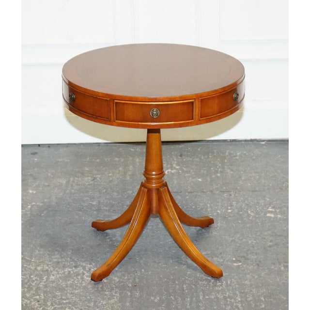 Lovely Vintage Yew Wood Circular Drum Table. A very well made and solid table with 3 small drawers and 3 faux drawers....