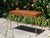 Featured is a vintage French Empire style console table. The table is finished with a burl top and all four sides resting...