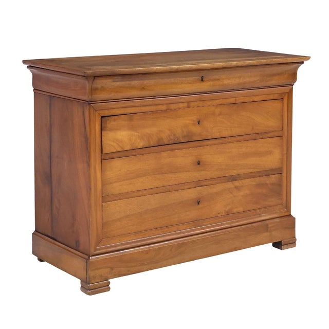 Authentic French Louis Philippe period commode crafted in richly figured burled walnut, featuring three dovetailed drawers...