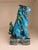 A handsome matched pair of mid-century Japanese guardian lions — komainu, also known as shishi or foo dogs — in a deep...