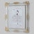 An Original Watercolor Figurative Painting of a Fashion forward Woman Encased in a White and Gold Ornate Picture Frame...