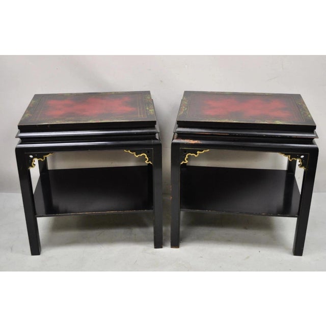Vintage Chinoiserie Style Black Lacquered Red Leather Top 2 Tier Side/End Tables - a Pair. Item features red tooled...