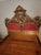 Elegant Italian-made bed frame featuring exquisite hand-carved detailing, graceful curves, and a rich gilt finish. Crafted...