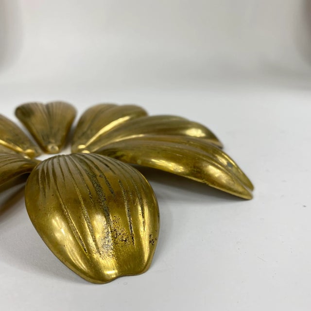 Set of Eight Vintage Flower Petal Brass Individual Ashtrays. Great arranged and displayed as a decorative object.