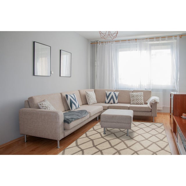 Trendy Diamond Gray Hand Knotted Wool Rug, Country of Origin: India. This exceptional piece is a striking example of how...