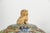 A pair of Chinese enamel covered ginger jars topped with a gilt bronze Buddhist lion finial and richly decorated with...