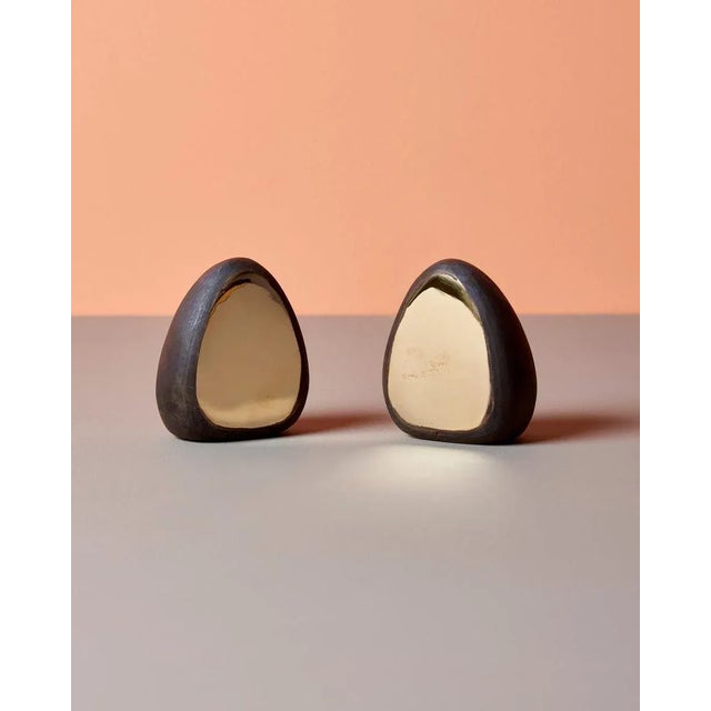 Classic pair of Carl Auböck bookend in a patina and polish brass mix. This piece is attributed to the mentioned...