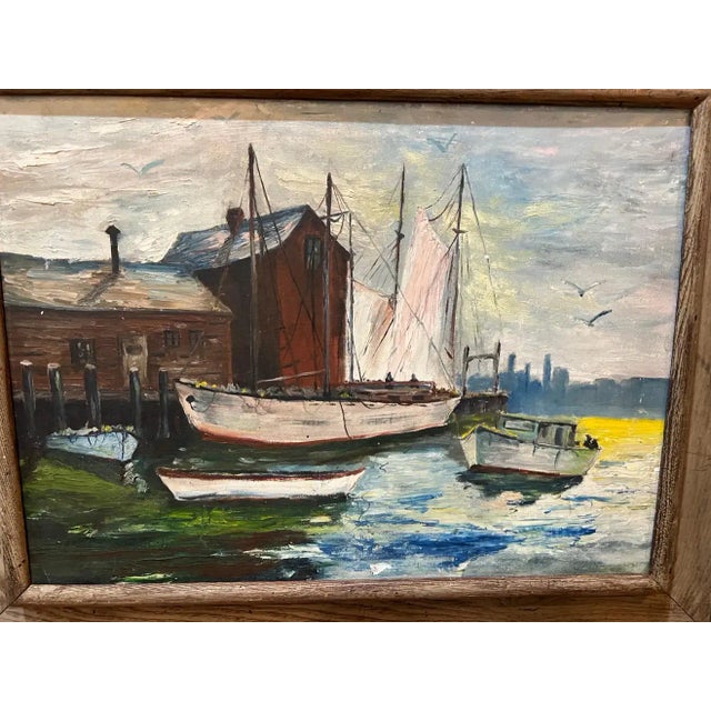 Mid Century Painting of boats in Harbor. Framed in a mid century driftwood color frame. Perfect for that coastal home with...