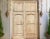 Once a fortress door in Rajasthan, India, this beautiful pair of antique carved doors are made from solid teak wood which...
