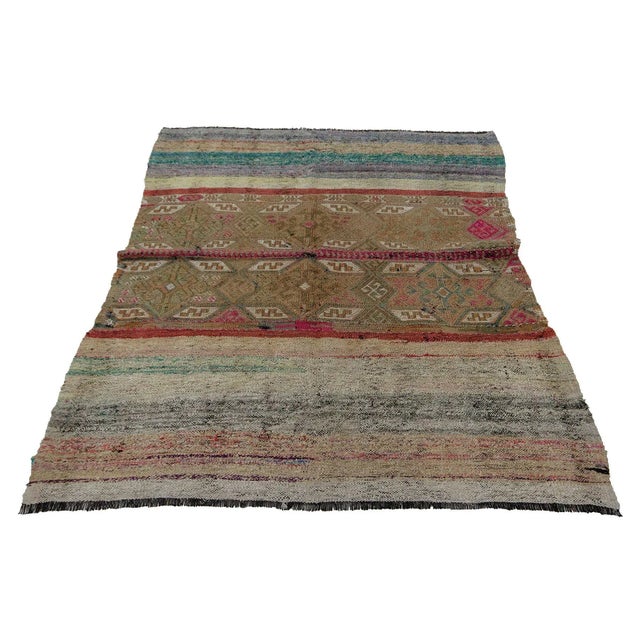 Decorative vintage handwoven kilim rug from Marash region of Turkey. Approximately 50-60 years old. In very good condition.