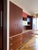 Designed by R&D Poliform Authentic Italian modular day/wall system in warm reddish-brown wood with light wood edges and...
