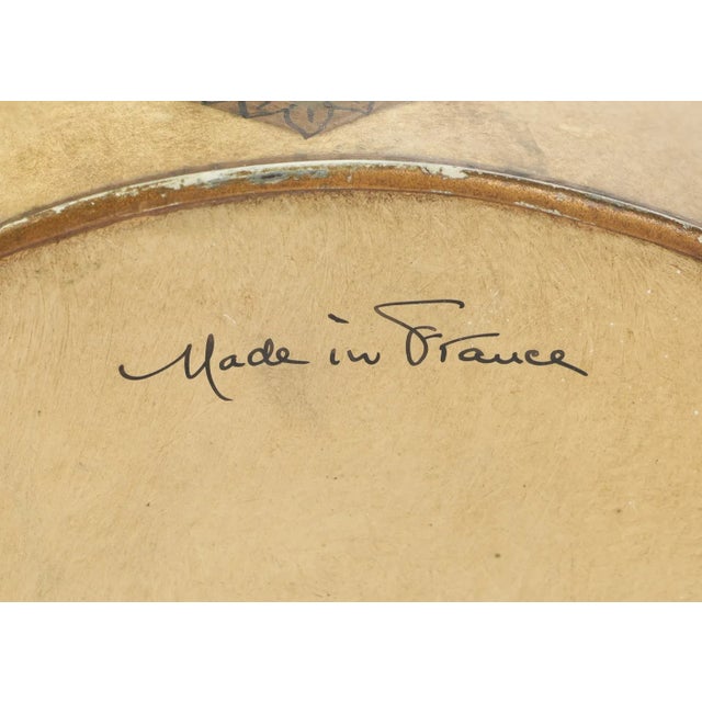 1950's French tole jardiniere cachepot in cream and gold, in quatrefoil form, with an equestrian Pegasus and rider motif,...