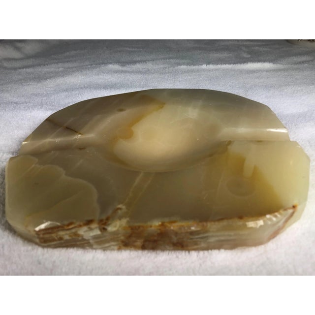 Vintage Mid 70’s hand carved Onyx Ash Tray Mexico. This large, heavy piece is made from a solid piece of onyx in creamy...