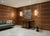 A commanding 51-inch square bas relief panel depicting the golden age of New York City — the Chrysler Building rising...