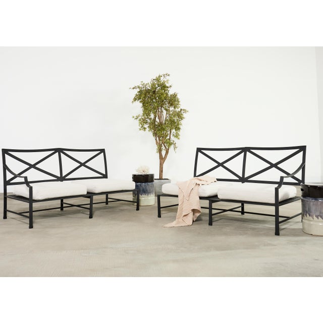 A two-piece modular "Carmel" aluminum sofa by Restoration Hardware with eight cushions. The Carmel collection sofa...