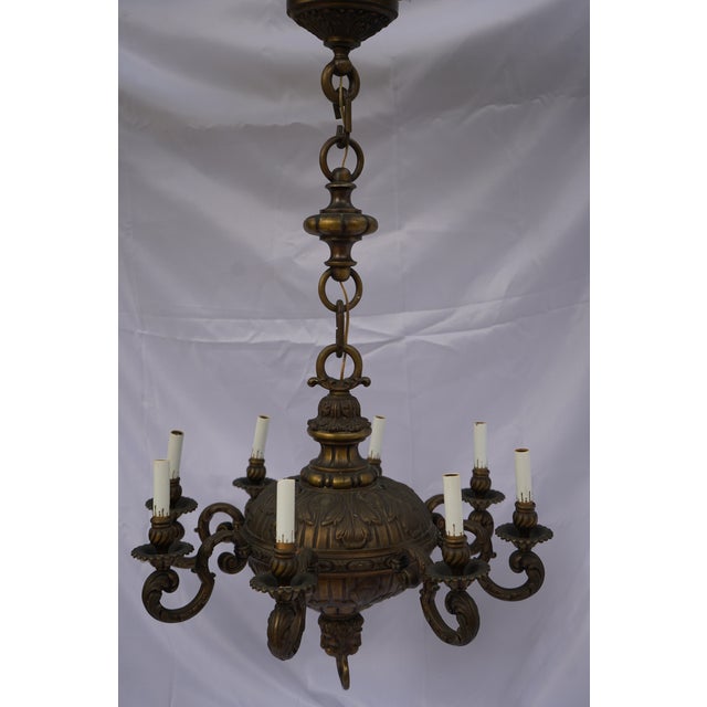 Monumental French Baroque Revival Eight-Light Cast Bronze Chandelier, Probably French, Circa 1915–1925 A magnificent and...