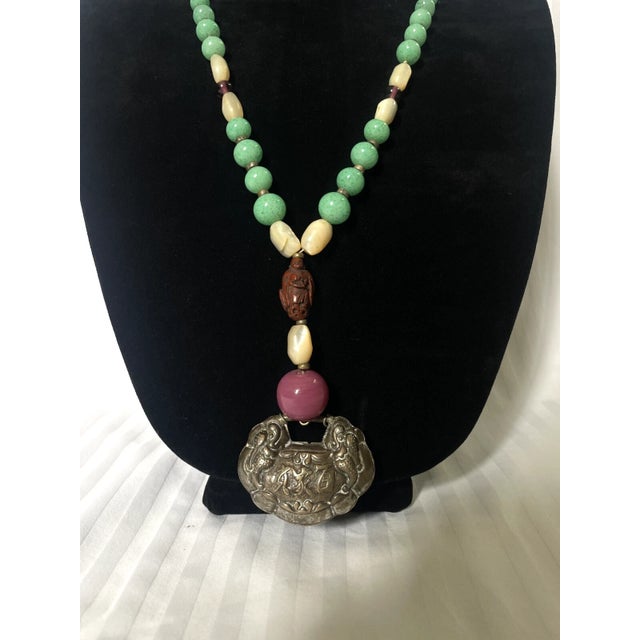 Turquoise Early 20th Century Chinese Repousse Silver Amulet Pendant Necklace For Sale - Image 8 of 9