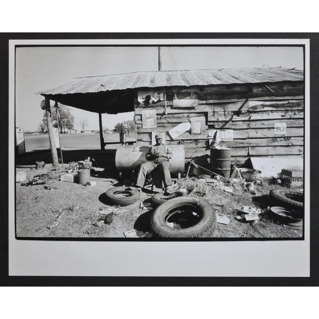 Mississippi area man sitting in front of his hut, usa early 1960s. keywords: usa; united states of america; deep south;...