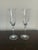 Elegant pair of authentic Ralph Lauren crystal champagne flutes featuring a sophisticated smoke-gray tint with clear...