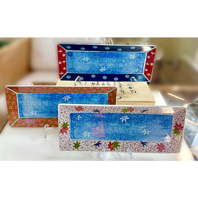 Three (3) Vintage Japanese sushi plates. New in wood box. Never used. A set of beautiful, vibrant sushi plates / platters....