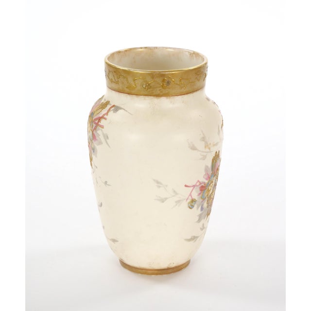 Explore the charm of this exquisite antique German porcelain decorative vase, adorned with intricate hand-painted floral...