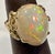White 10 Carat Oval Shape Ethiopian Opal Cocktail Ring 14 Karat Yellow Gold For Sale - Image 8 of 18