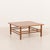 This elegant scandinavian mid-century square teak coffee table was made in denmark some time in the 1970s and is a refined...
