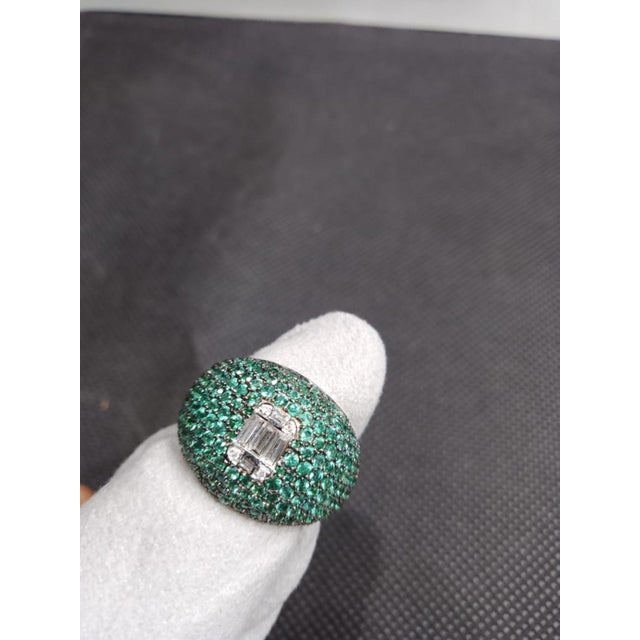 Gemstone details Gold Purity: 18K Solid Gold Emerald: 2.50 cts Diamond: 0.25 cts 18K gold Net weight: 7.04 grams Gross...
