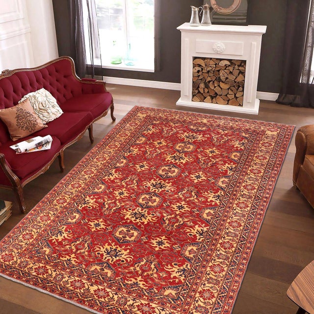 Enhance your home with this exquisite hand-knotted Super Kazak rug, crafted from fine hand-spun wool and dyed with all-...