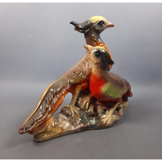 Fantastic ceramic sculpture, depiction of a pair of multi-coloured glazed pheasants, internal signature, Italy base,...