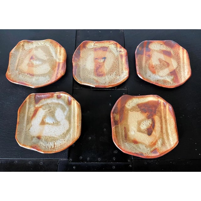 Japanese ceramic Suzuki Tomio (born in 1948) specializes in Shino ware. In 2003, he successfully developed Yohen-kin or...