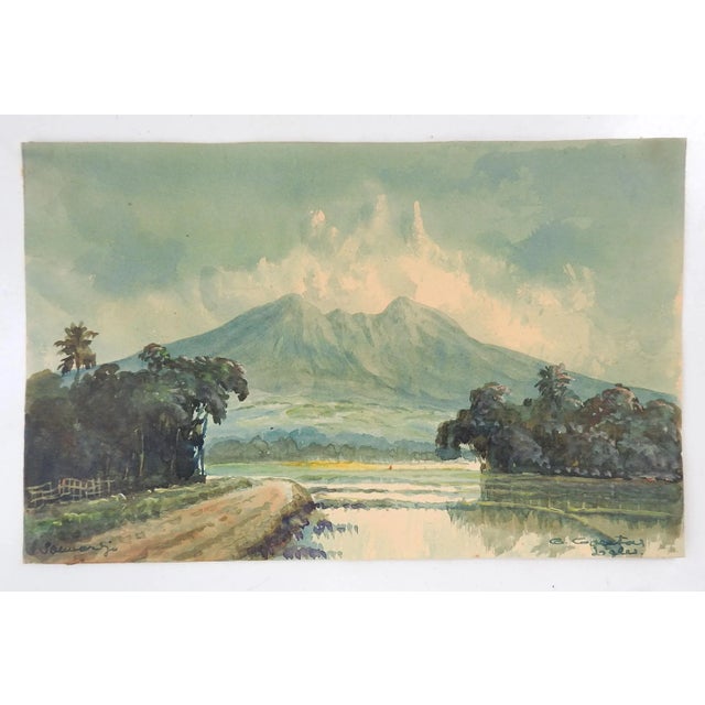 Pair of small vintage watercolor on paper Indonesian landscape paintings. Signed Soewardja with locale name along lower...