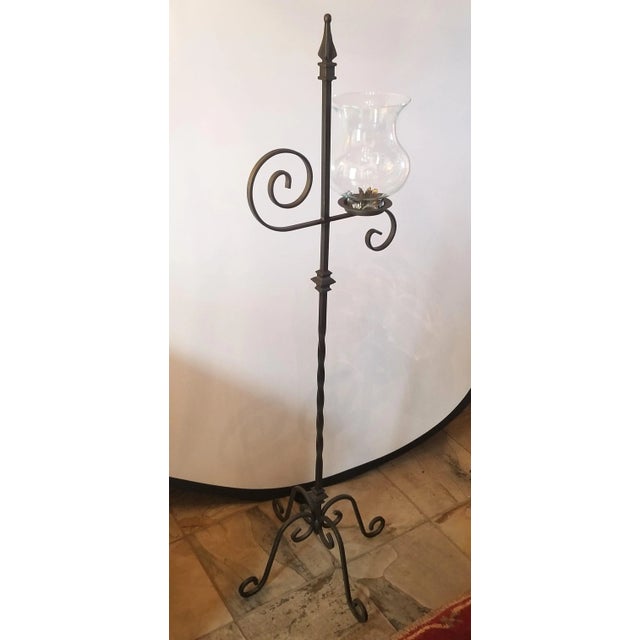 This candle stand would look perfect in your entry or living room! It's sturdy and has some pretty details. Holds a single...