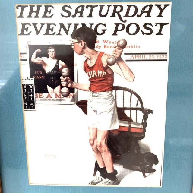 Norman Rockwell Saturday Evening Post Cover Print Weight Lifting– April 29, 1922 A midcentury licensed lithograph...