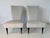 Charming Italian Art Deco bedroom armchairs from the 1940s, defined by their soft and enveloping silhouette that blends...