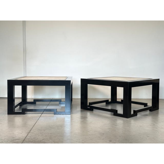 Pair of large coffee tables from the 70s, the style recalls that of Maison Jansen, wooden structure covered in black...