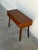 Beautiful vintage Scandinavian Modern console table crafted in warm teak by Glas & Trä, Sweden. This elegant piece...