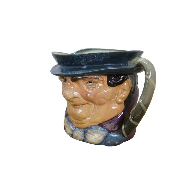 Large vintage Royal Doulton 5531 porcelain character jug of Tony Weller featuring a dark brimmed hat, maroon purple coat...