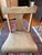 Antique primitive wooden farmhouse chair with plank seat, turned legs, and shaped crest rail with central splat. Solid...